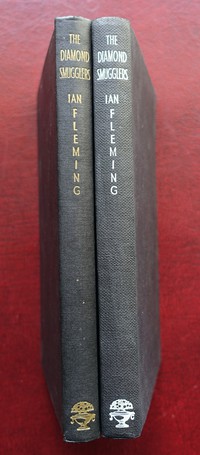 Jonathan Cape | The Diamond Smugglers. Most copies white titles to the spine.  A few like the ex-library book on the right have titles in gilt.